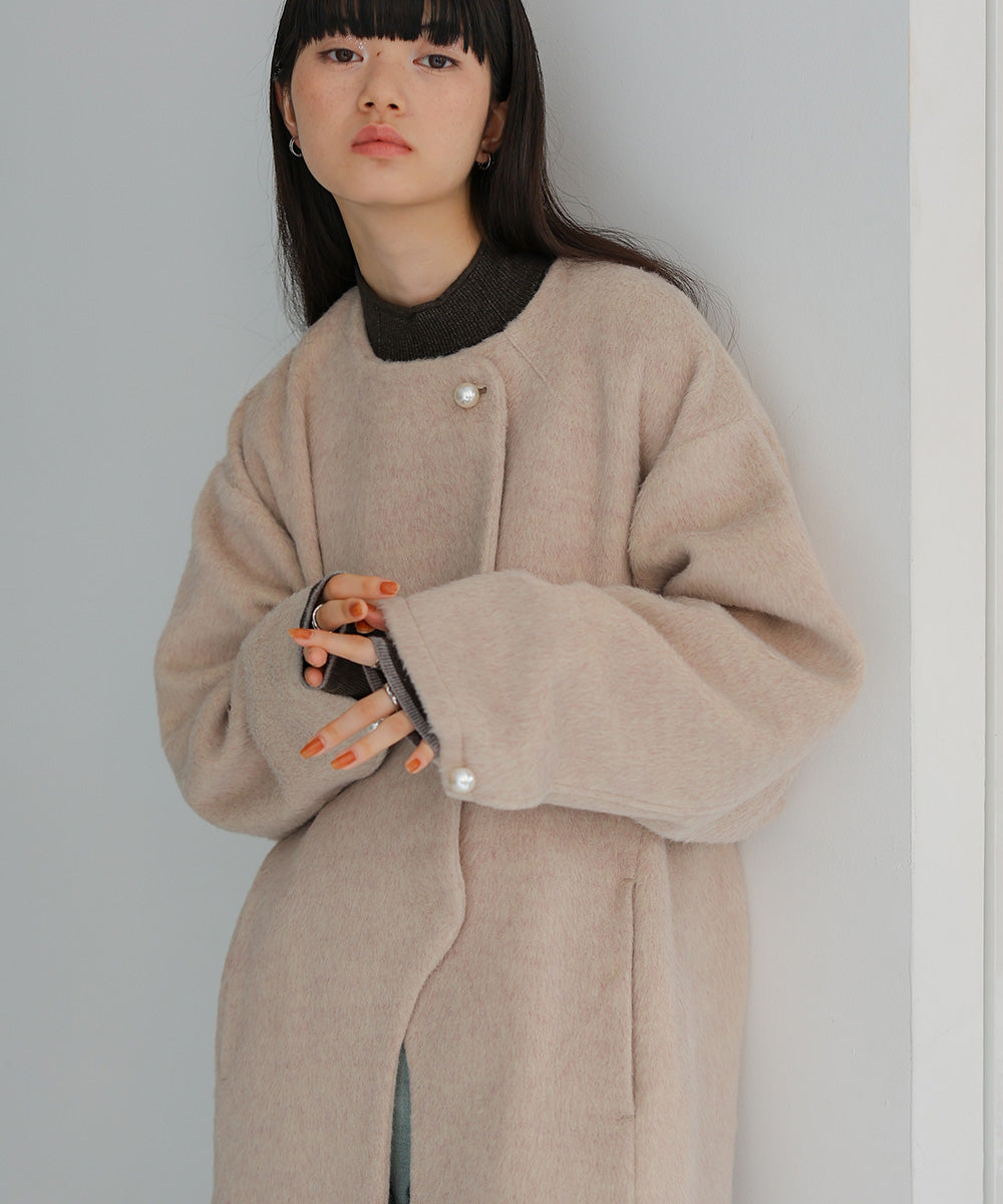 SHAGGY PEARL BUTTON OVER SILHOUETTE COAT