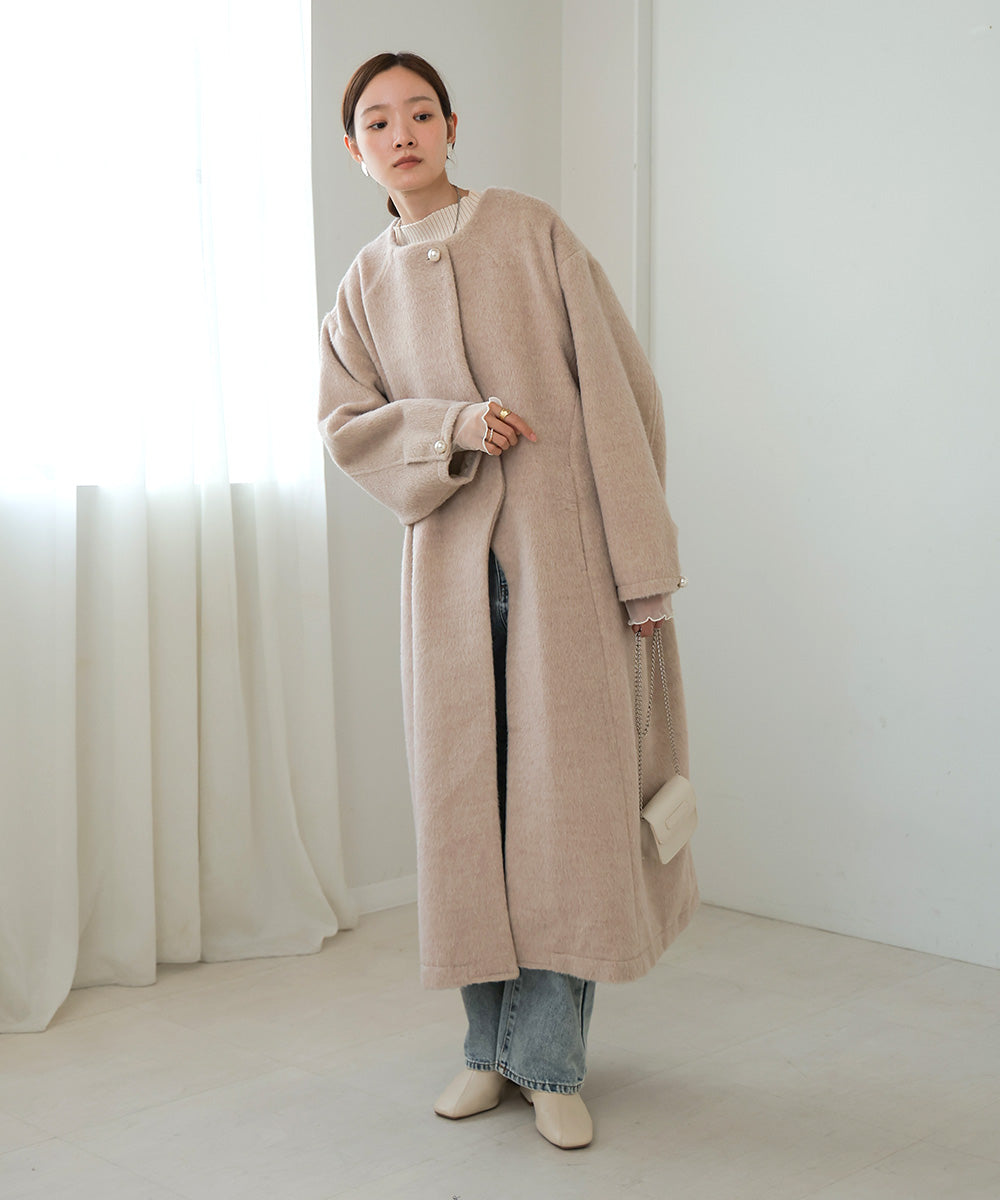 SHAGGY PEARL BUTTON OVER SILHOUETTE COAT