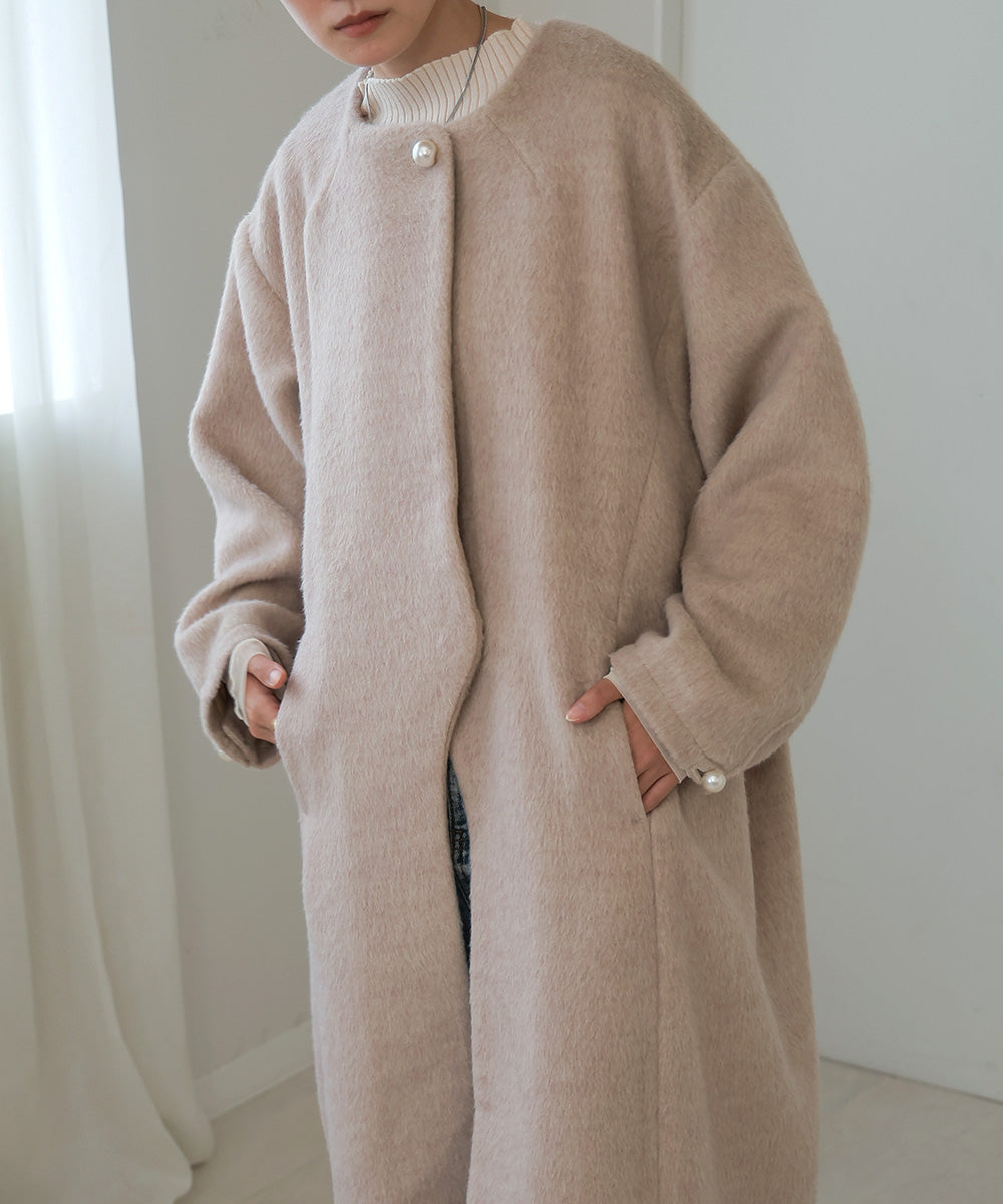 SHAGGY PEARL BUTTON OVER SILHOUETTE COAT