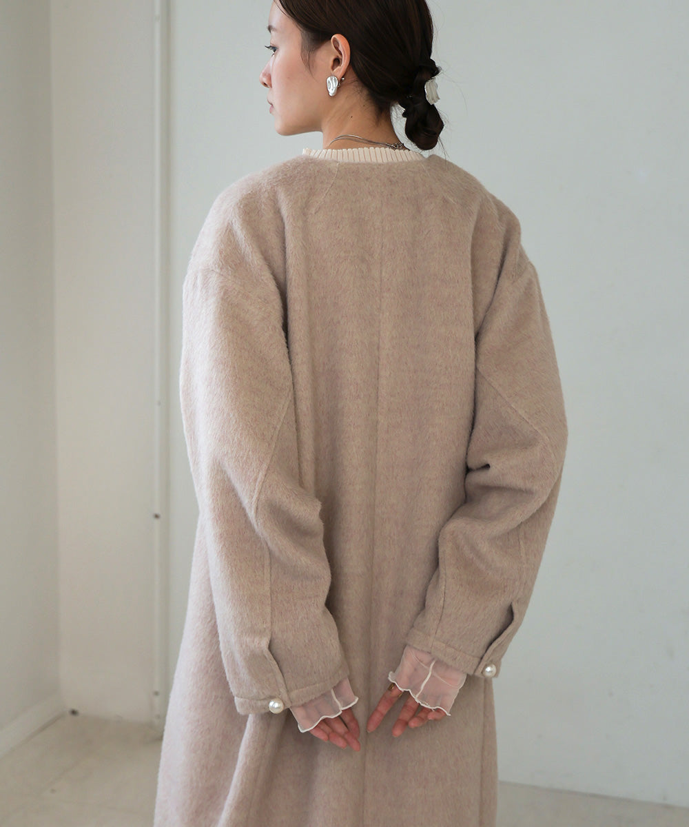 SHAGGY PEARL BUTTON OVER SILHOUETTE COAT