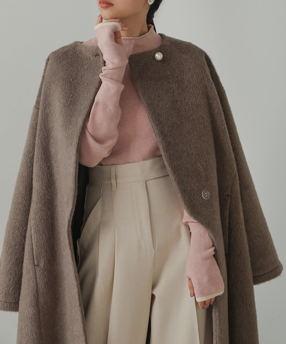 SHAGGY PEARL BUTTON OVER SILHOUETTE COAT