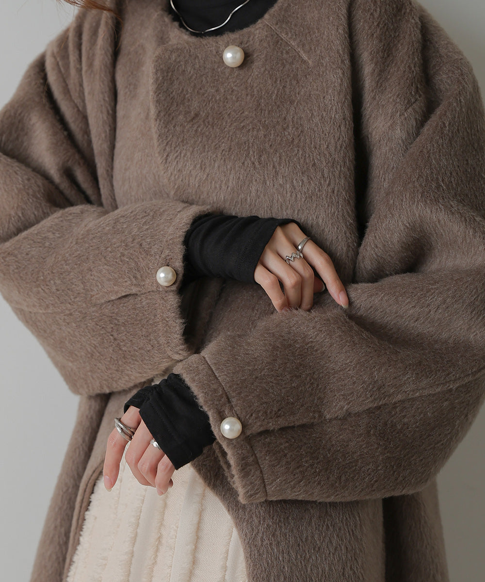 SHAGGY PEARL BUTTON OVER SILHOUETTE COAT