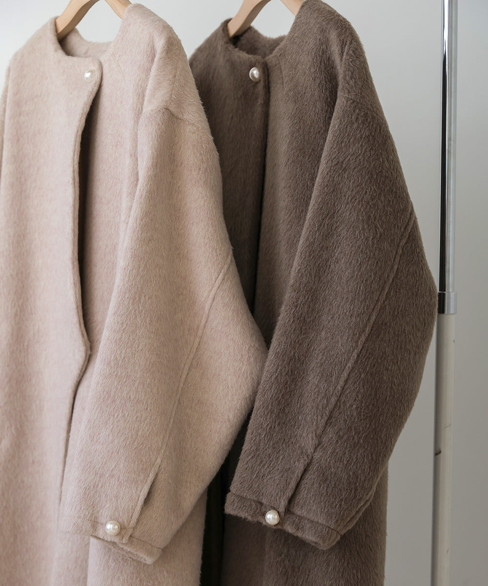 SHAGGY PEARL BUTTON OVER SILHOUETTE COAT