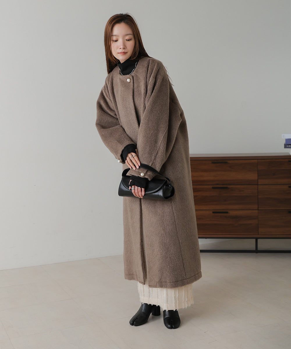 SHAGGY PEARL BUTTON OVER SILHOUETTE COAT