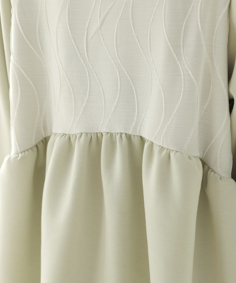 ウェーブ切り替えペプラムトップス