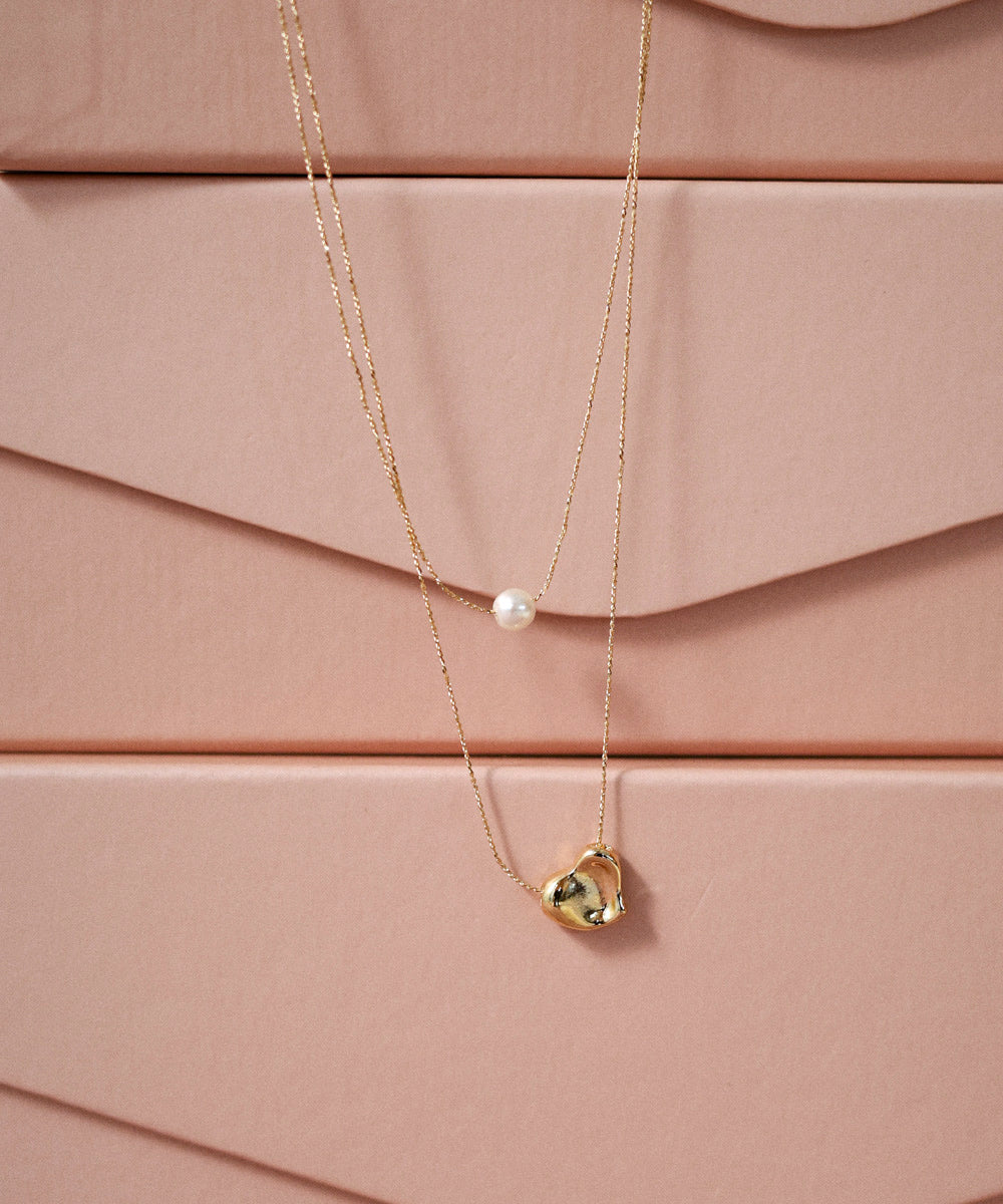 ニュアンスハートレイヤードネックレス