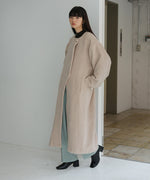 SHAGGY PEARL BUTTON OVER SILHOUETTE COAT
