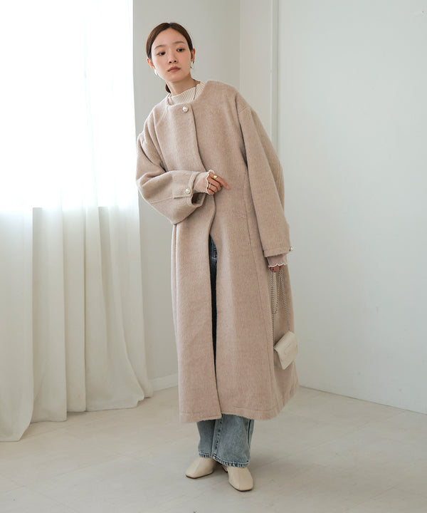 SHAGGY PEARL BUTTON OVER SILHOUETTE COAT