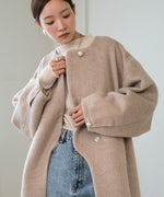 SHAGGY PEARL BUTTON OVER SILHOUETTE COAT