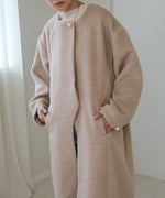 SHAGGY PEARL BUTTON OVER SILHOUETTE COAT