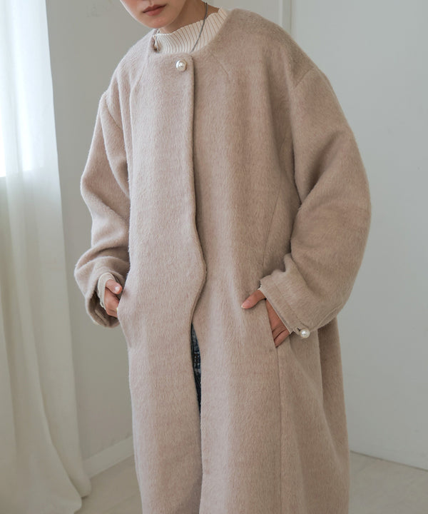 SHAGGY PEARL BUTTON OVER SILHOUETTE COAT