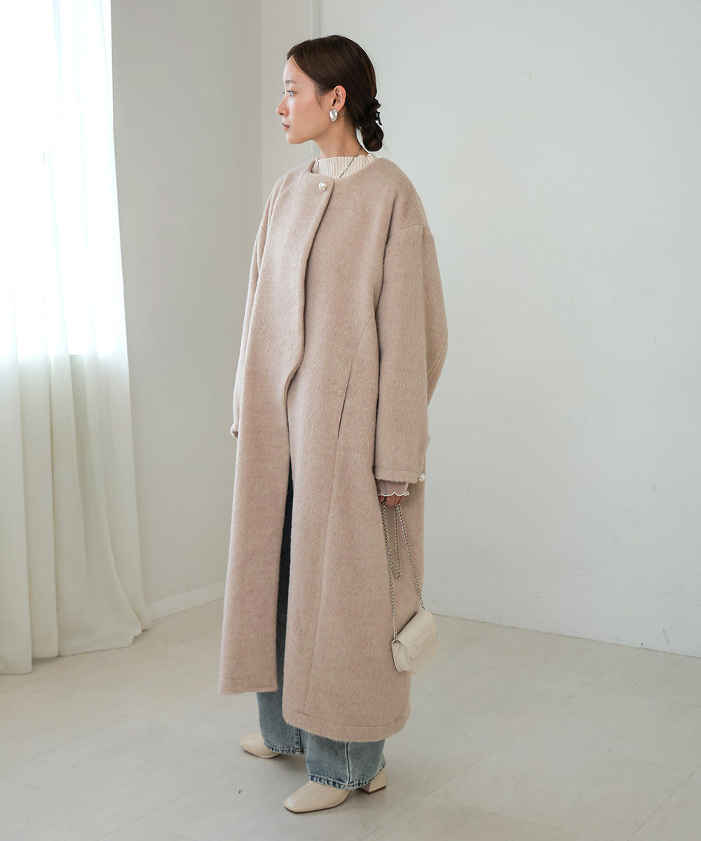 SHAGGY PEARL BUTTON OVER SILHOUETTE COAT