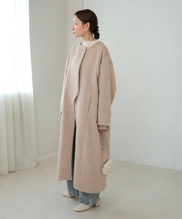 SHAGGY PEARL BUTTON OVER SILHOUETTE COAT