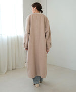 SHAGGY PEARL BUTTON OVER SILHOUETTE COAT