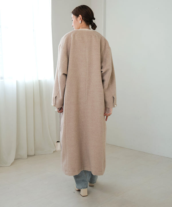 SHAGGY PEARL BUTTON OVER SILHOUETTE COAT
