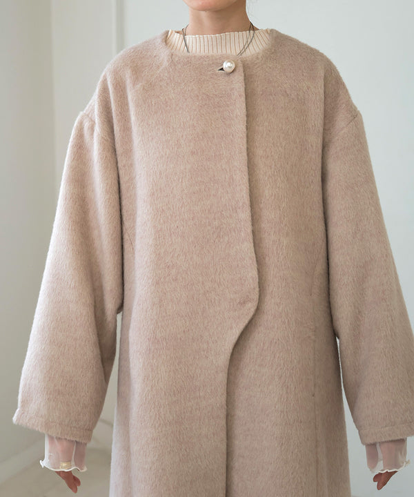 SHAGGY PEARL BUTTON OVER SILHOUETTE COAT