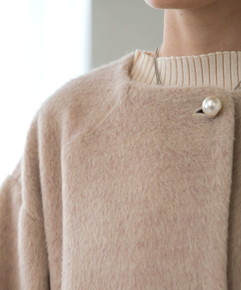 SHAGGY PEARL BUTTON OVER SILHOUETTE COAT