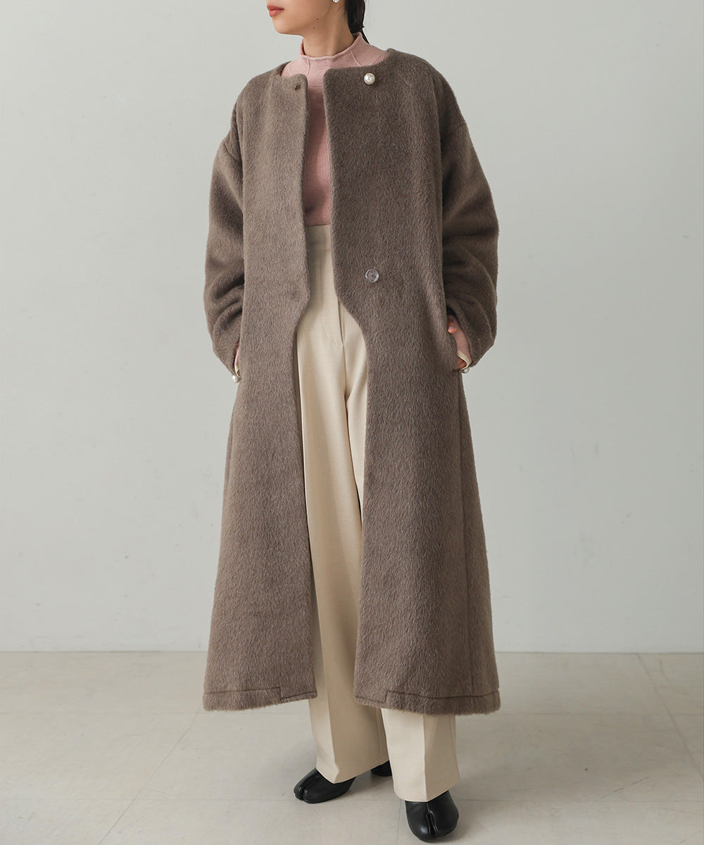 SHAGGY PEARL BUTTON OVER SILHOUETTE COAT
