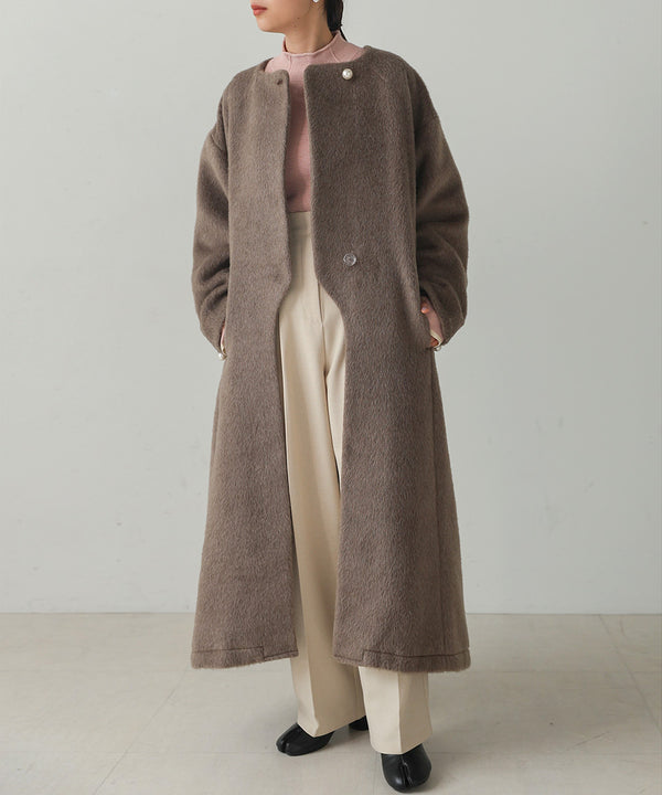 SHAGGY PEARL BUTTON OVER SILHOUETTE COAT