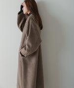 SHAGGY PEARL BUTTON OVER SILHOUETTE COAT