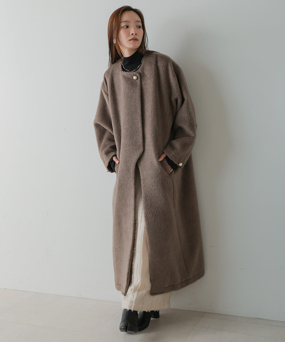 SHAGGY PEARL BUTTON OVER SILHOUETTE COAT