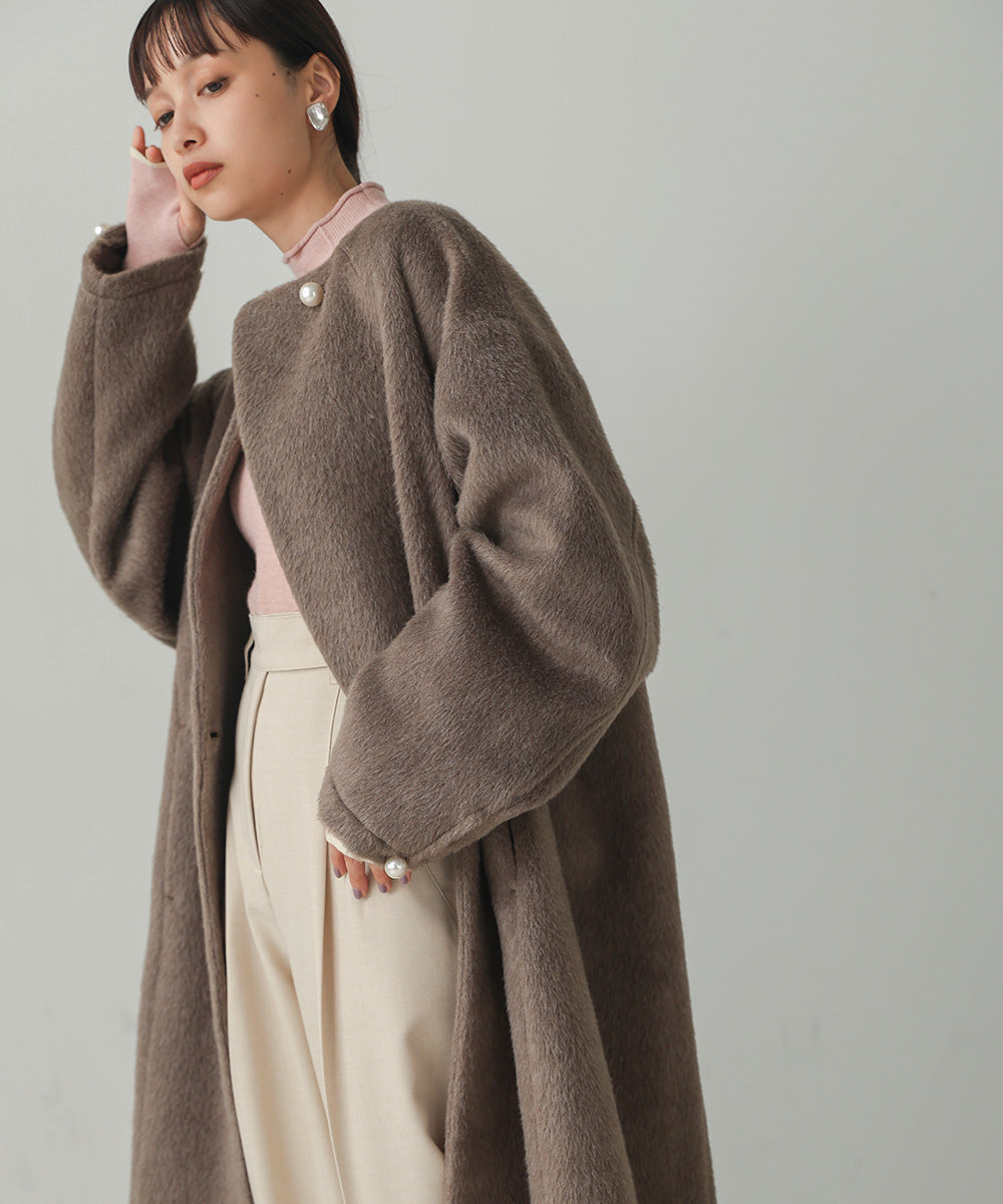 SHAGGY PEARL BUTTON OVER SILHOUETTE COAT