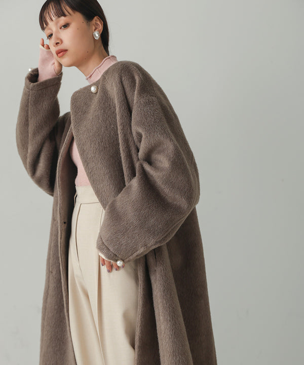 SHAGGY PEARL BUTTON OVER SILHOUETTE COAT
