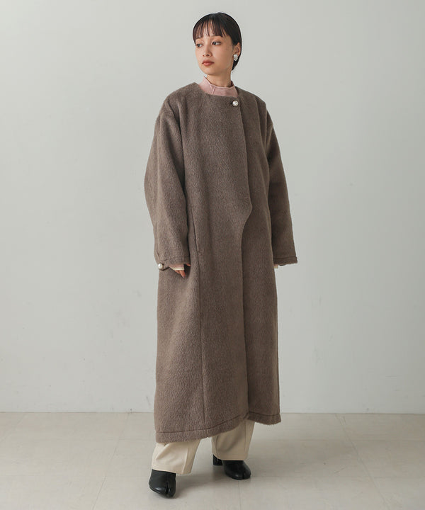 SHAGGY PEARL BUTTON OVER SILHOUETTE COAT