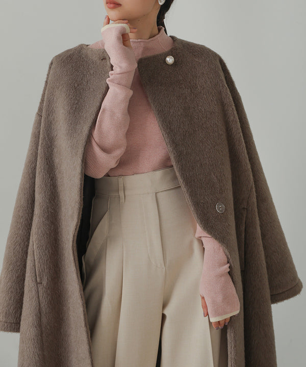 SHAGGY PEARL BUTTON OVER SILHOUETTE COAT