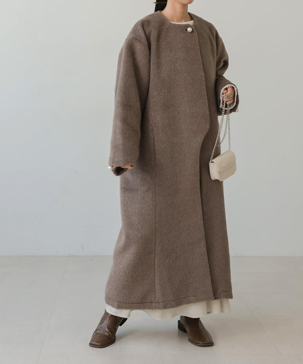SHAGGY PEARL BUTTON OVER SILHOUETTE COAT