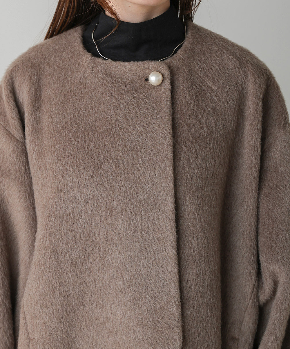 SHAGGY PEARL BUTTON OVER SILHOUETTE COAT