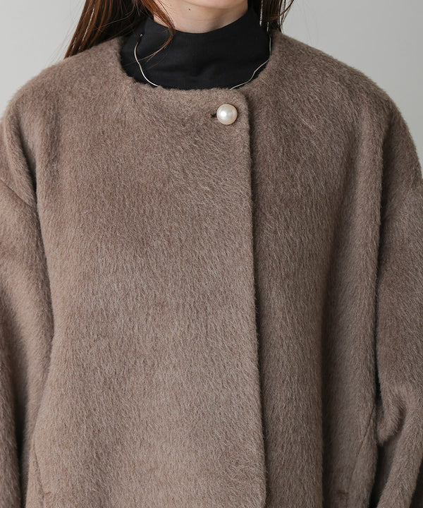 SHAGGY PEARL BUTTON OVER SILHOUETTE COAT