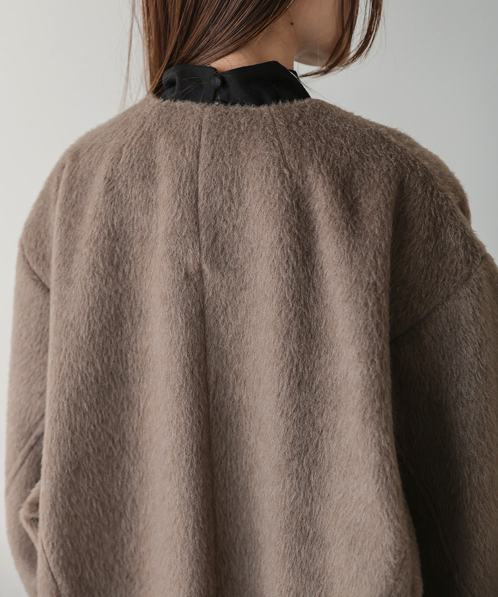 SHAGGY PEARL BUTTON OVER SILHOUETTE COAT