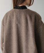 SHAGGY PEARL BUTTON OVER SILHOUETTE COAT