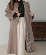 SHAGGY PEARL BUTTON OVER SILHOUETTE COAT