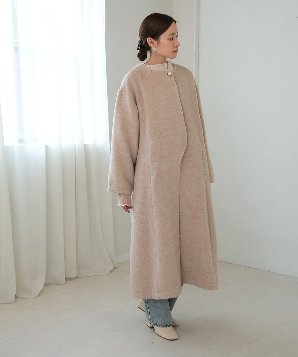 SHAGGY PEARL BUTTON OVER SILHOUETTE COAT