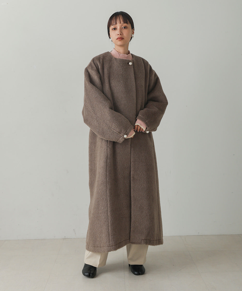 SHAGGY PEARL BUTTON OVER SILHOUETTE COAT