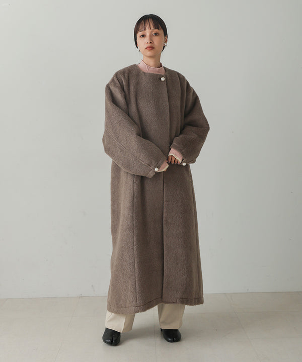 SHAGGY PEARL BUTTON OVER SILHOUETTE COAT
