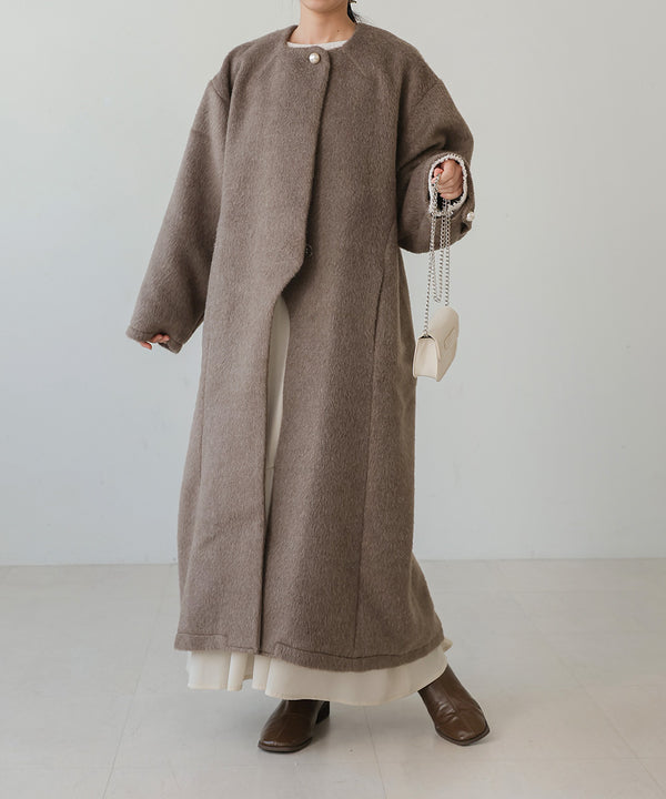 SHAGGY PEARL BUTTON OVER SILHOUETTE COAT