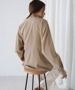 TWISTED FRONT BUSTIER STYLE BLOUSE