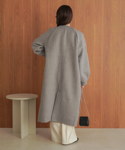 shaggy collarless long coat