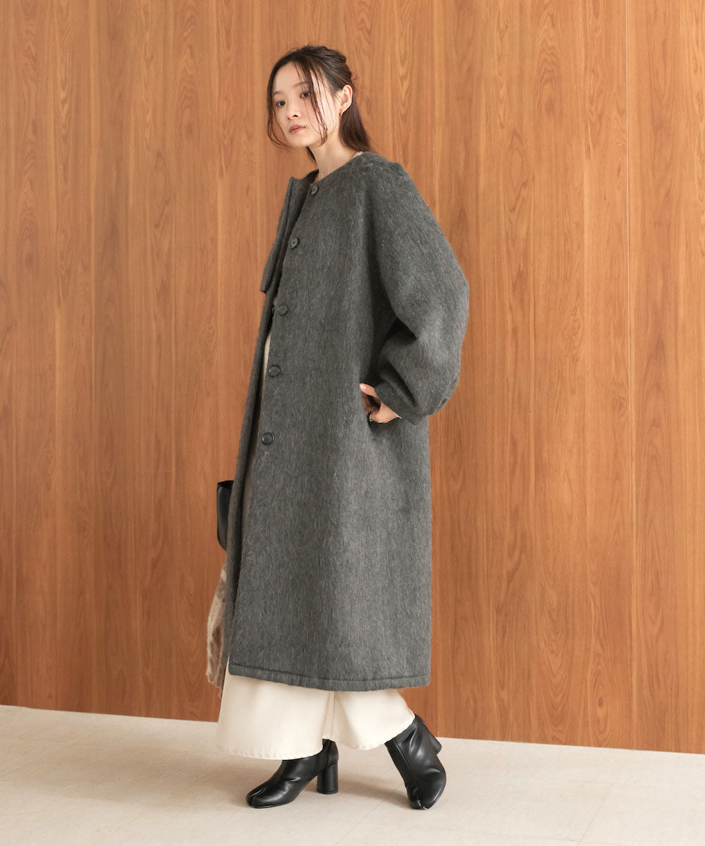 shaggy collarless long coat