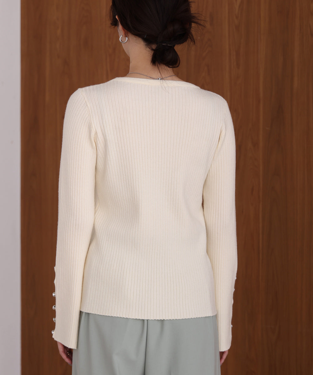 flared sleeve ribbed knit with buttoned sleeves