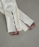 スリットニットトップス