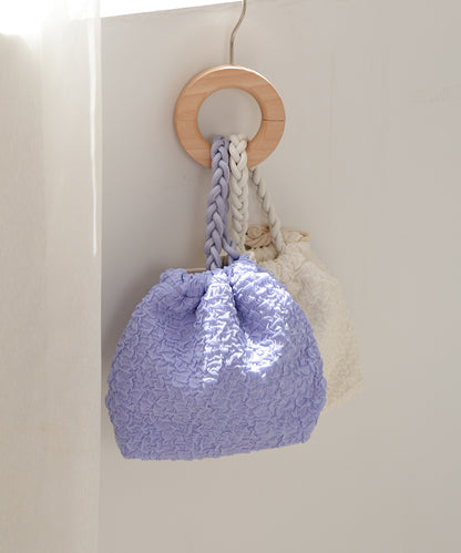 Knitted handle drawstring bag
