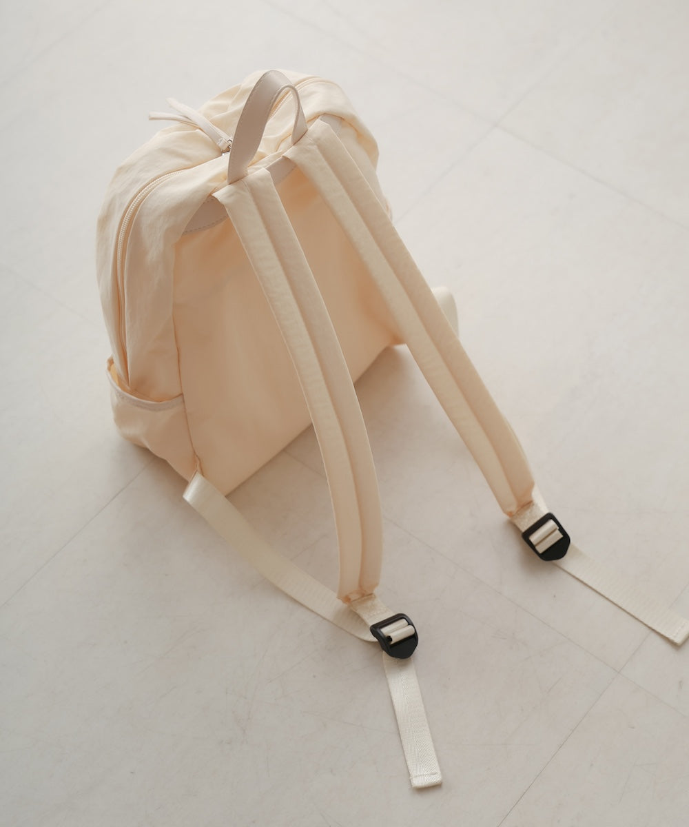 ribbon zip backpack