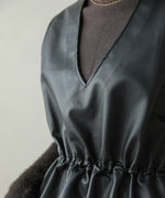 peplum faux leather vest