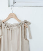 ショルダーリボンデザインブラウス