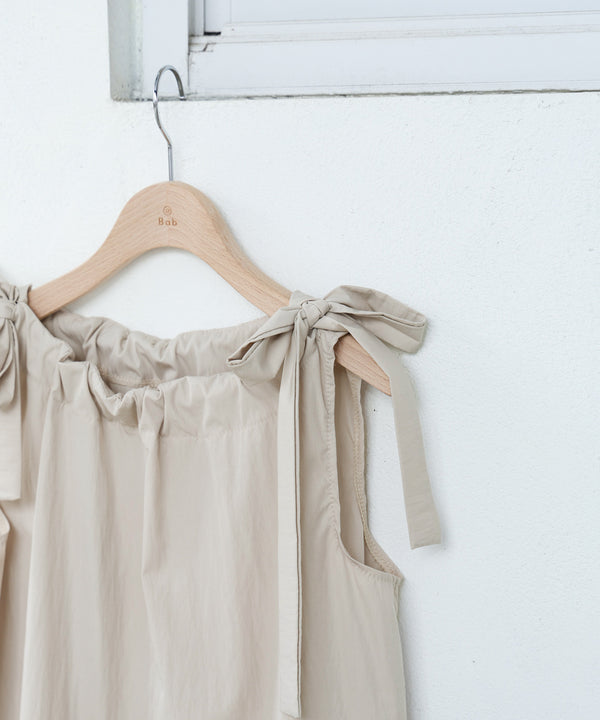 ショルダーリボンデザインブラウス