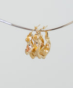 ニュアンスネジリフープピアス